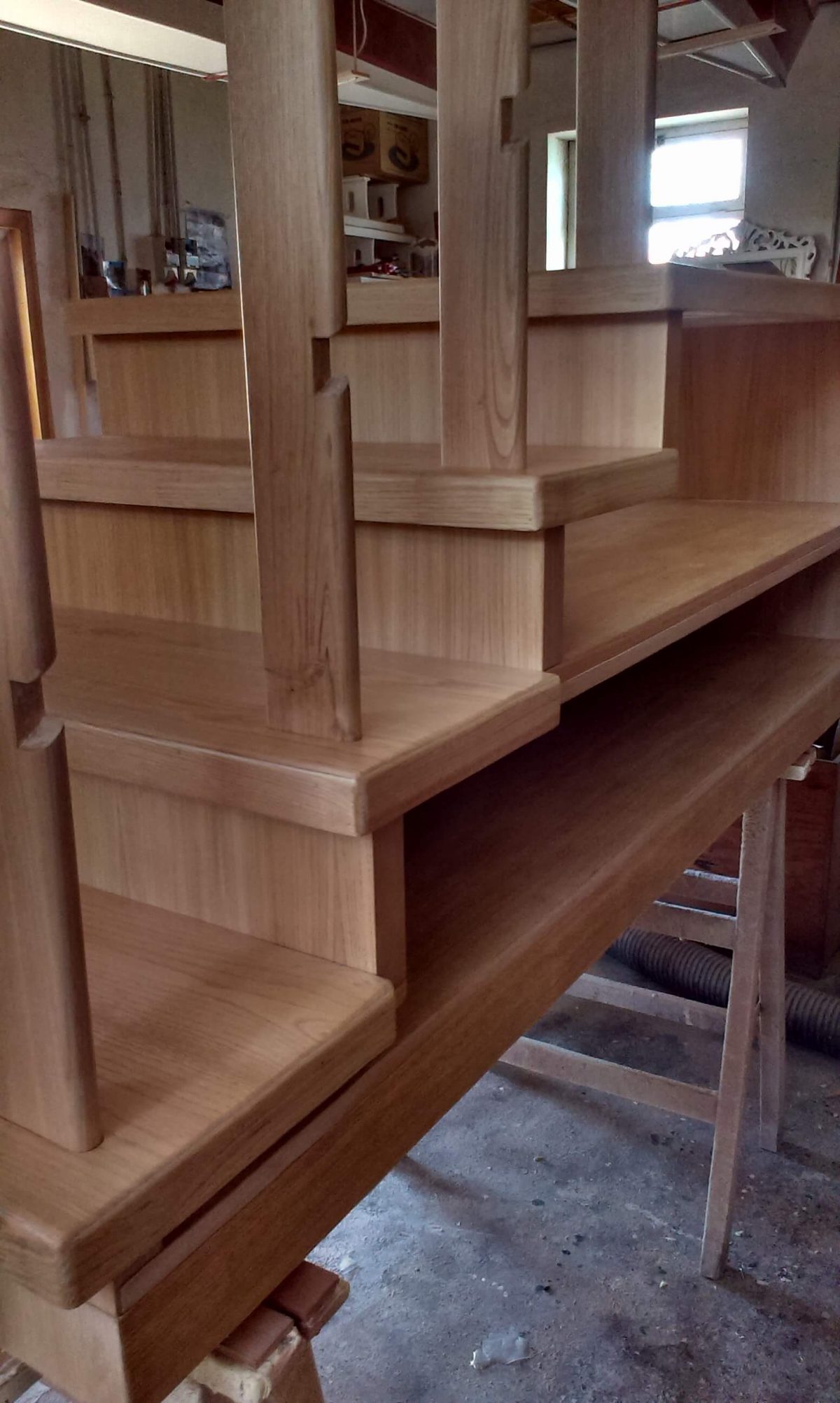 Lounge Bookshelves 4 step stair in progress Detail